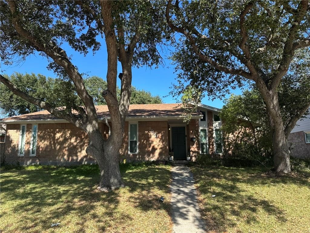 1506 Briar Street Portland, TX 78374 - Photo 1 of 40 a view of a house with bunch of trees