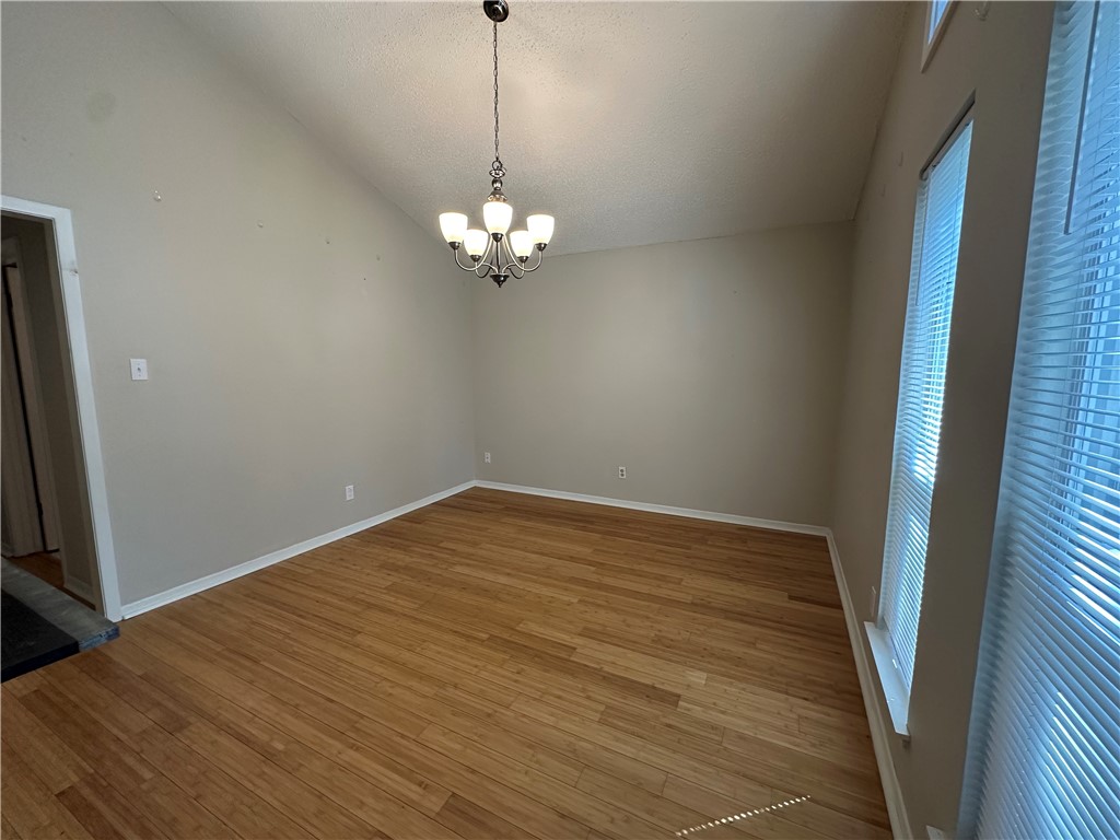 1506 Briar Street Portland, TX 78374 - Photo 2 of 40 a view of empty room with wooden floor