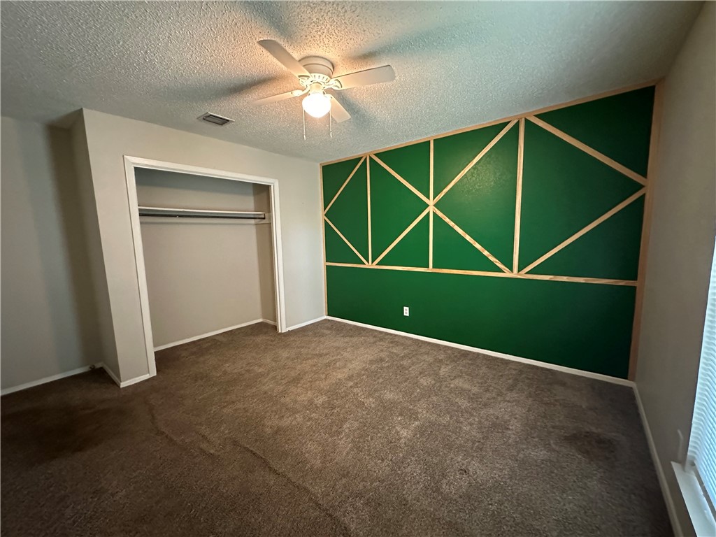 1506 Briar Street Portland, TX 78374 - Photo 24 of 40 an empty room with closet and entryway