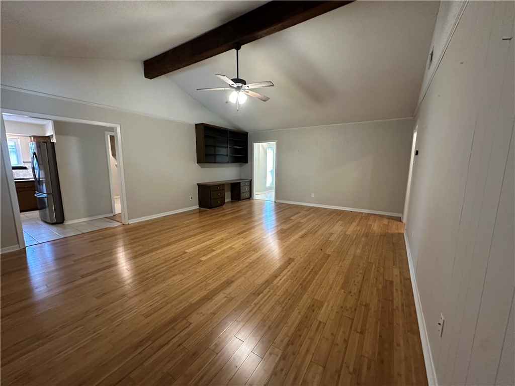 1506 Briar Street Portland, TX 78374 - Photo 8 of 40 wooden floor in an empty room with a window
