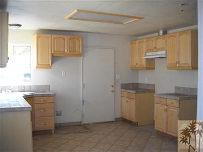 82130 Adobe Road Indio, CA 92201 - Photo 4 of 11 a room with storage and utility