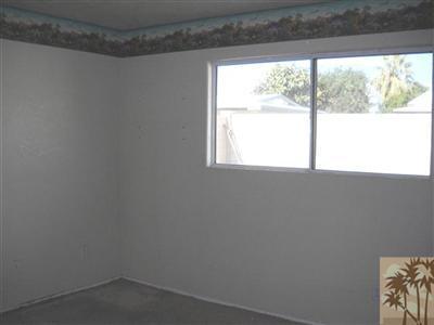82130 Adobe Road Indio, CA 92201 - Photo 9 of 11 a view of an empty room and window