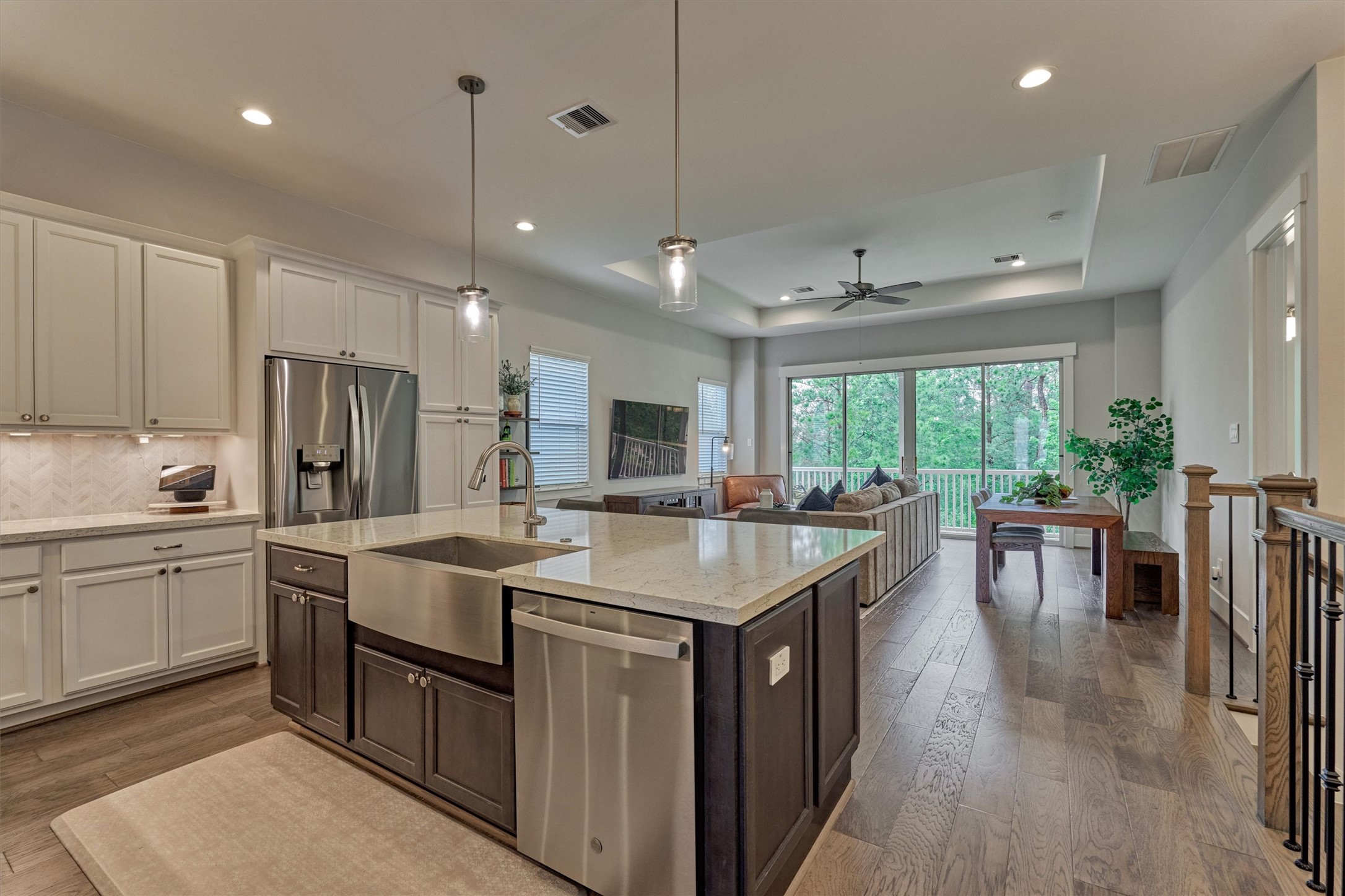 a kitchen with center island table and chairs