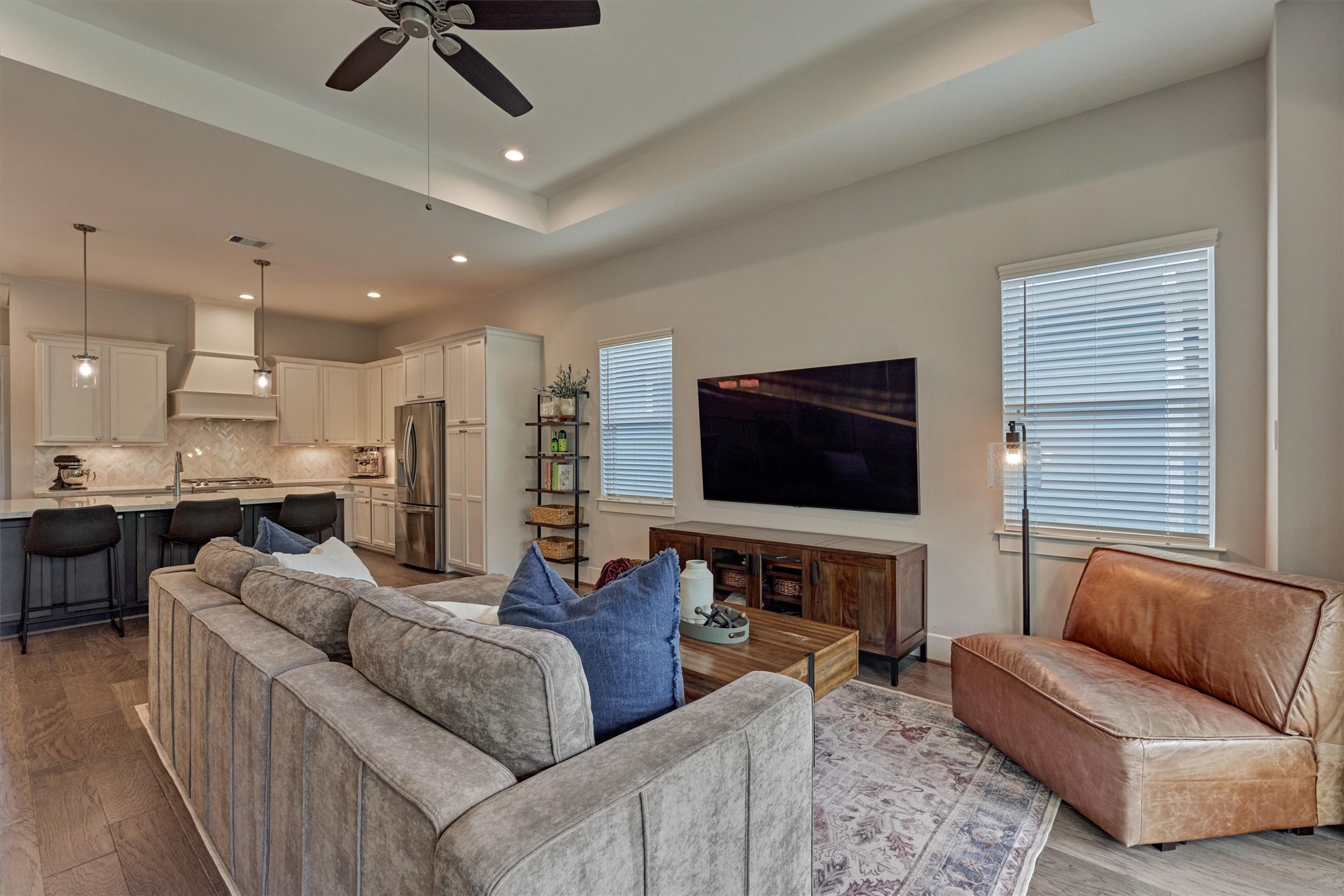 62 Dobbs View Lane Spring, TX 77389 - Photo 14 of 42 a living room with furniture and a flat screen tv