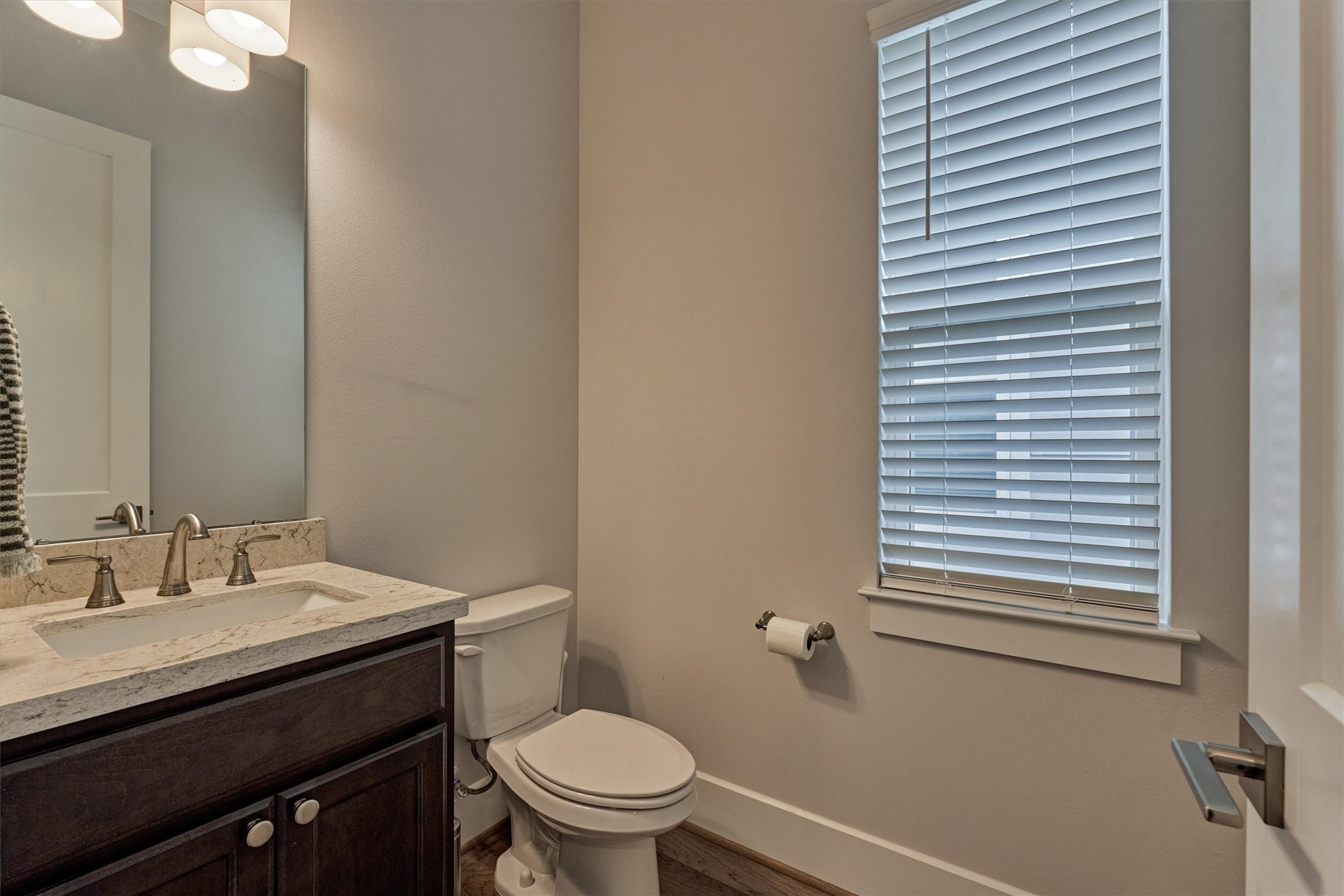 62 Dobbs View Lane Spring, TX 77389 - Photo 18 of 42 a bathroom with a sink and a toilet