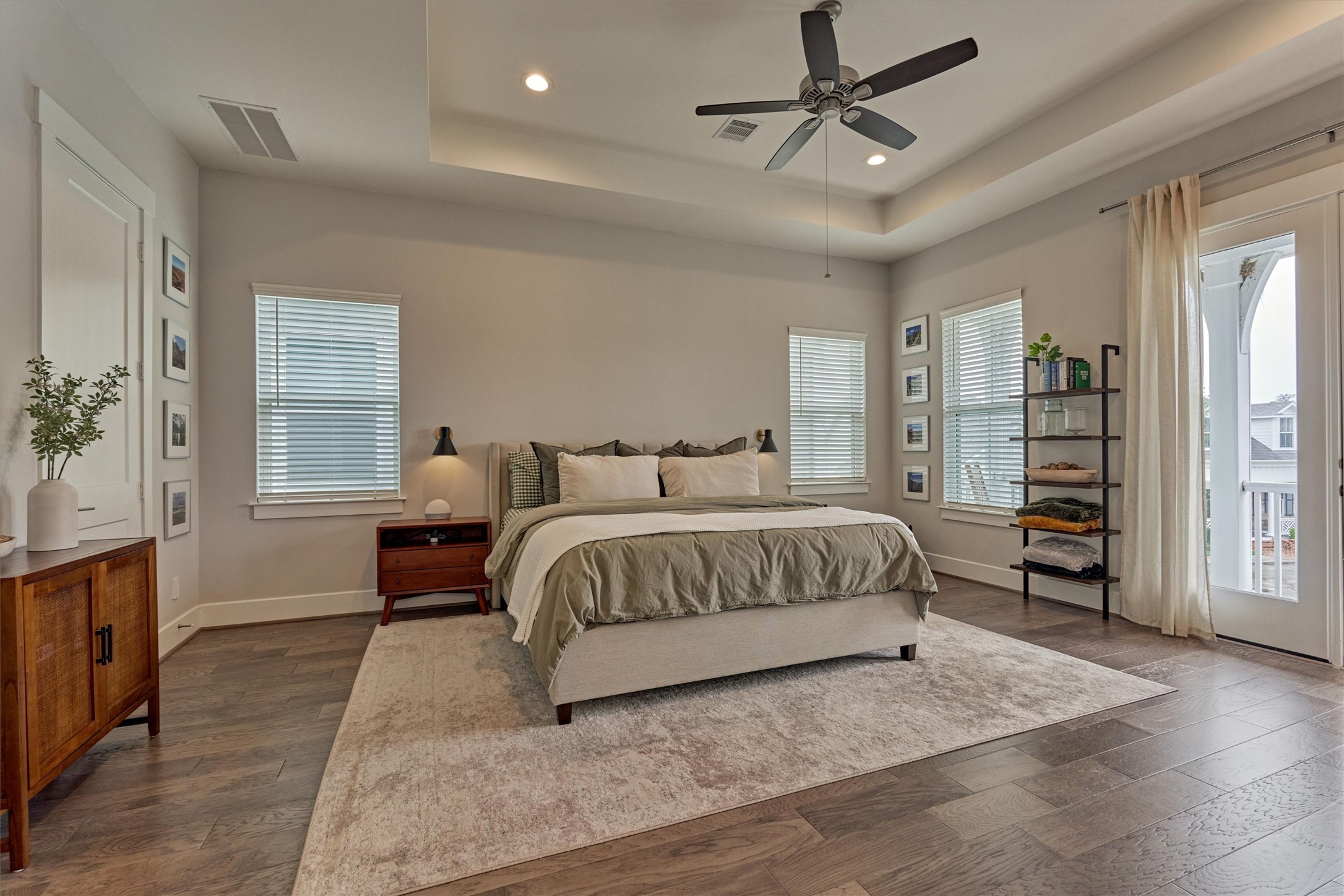 62 Dobbs View Lane Spring, TX 77389 - Photo 20 of 42 a bedroom with a large bed a chandelier and closet