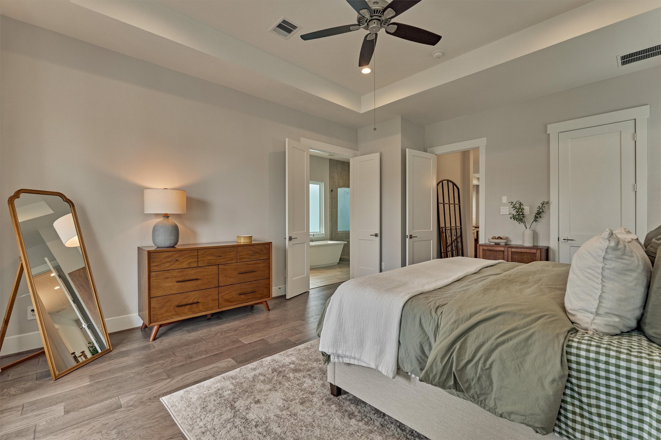 62 Dobbs View Lane Spring, TX 77389 - Photo 22 of 42 a bed room with a bed and a dresser