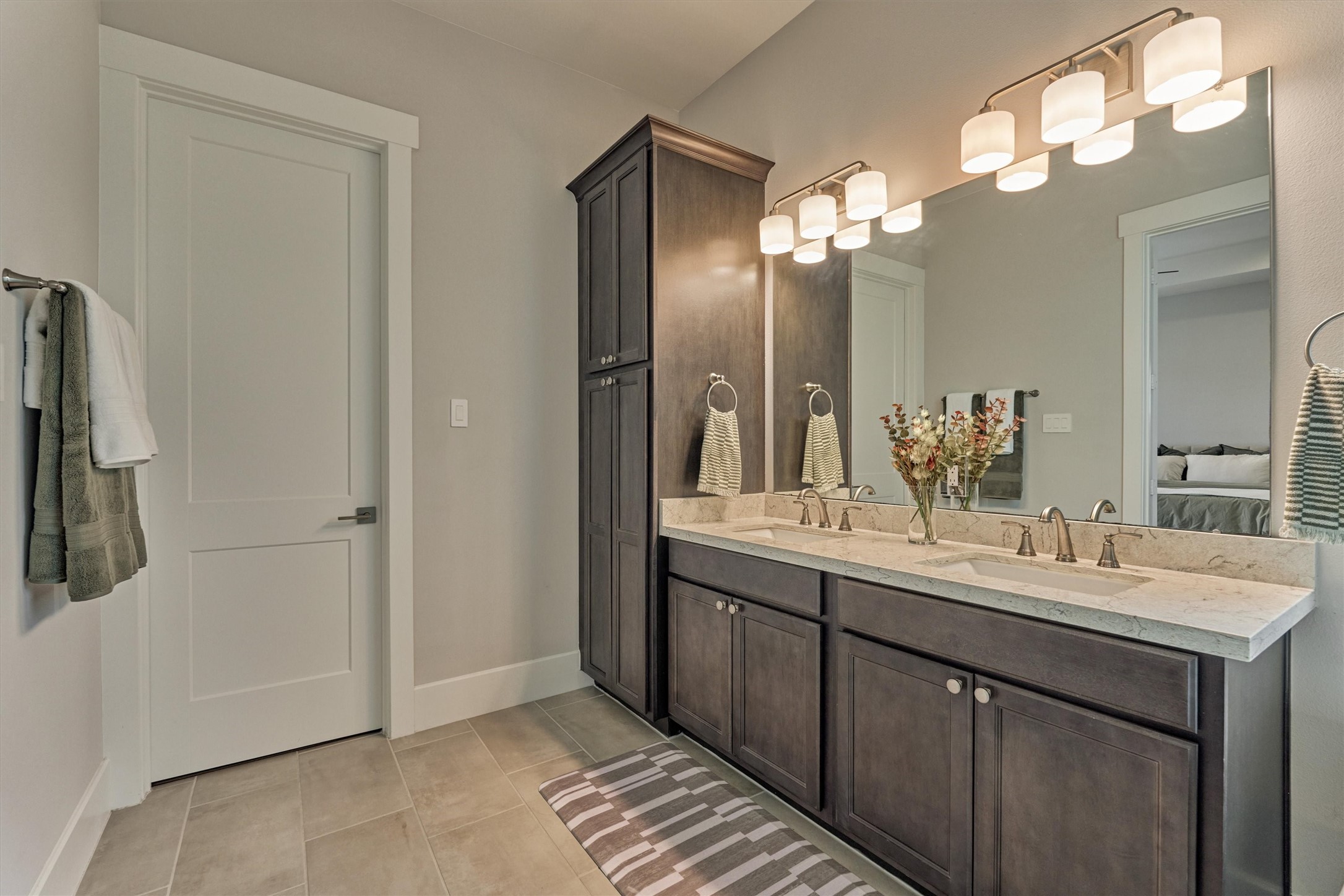 62 Dobbs View Lane Spring, TX 77389 - Photo 24 of 42 a bathroom with a double vanity sink and a mirror