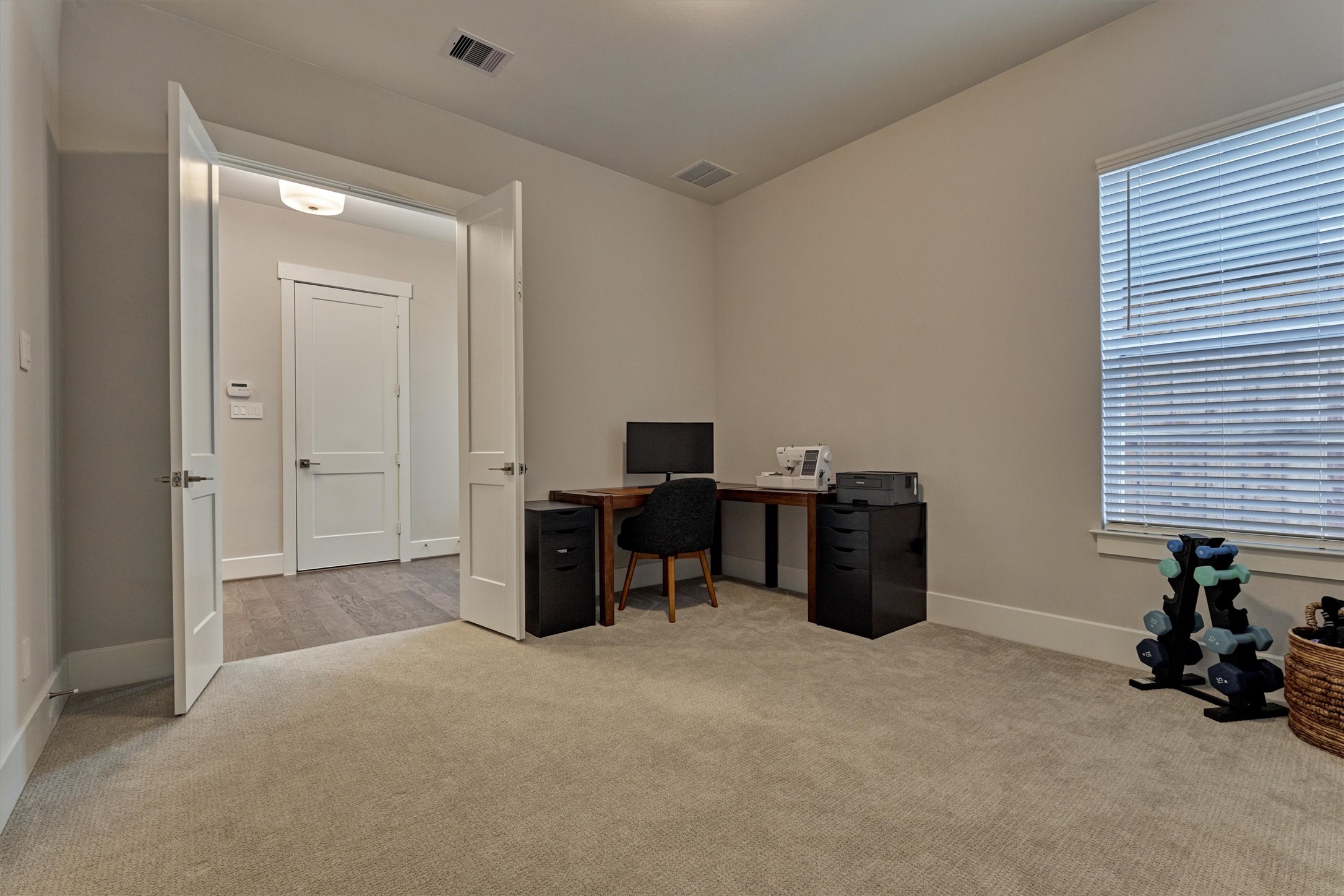 62 Dobbs View Lane Spring, TX 77389 - Photo 26 of 42 a view of a workspace with furniture and a window