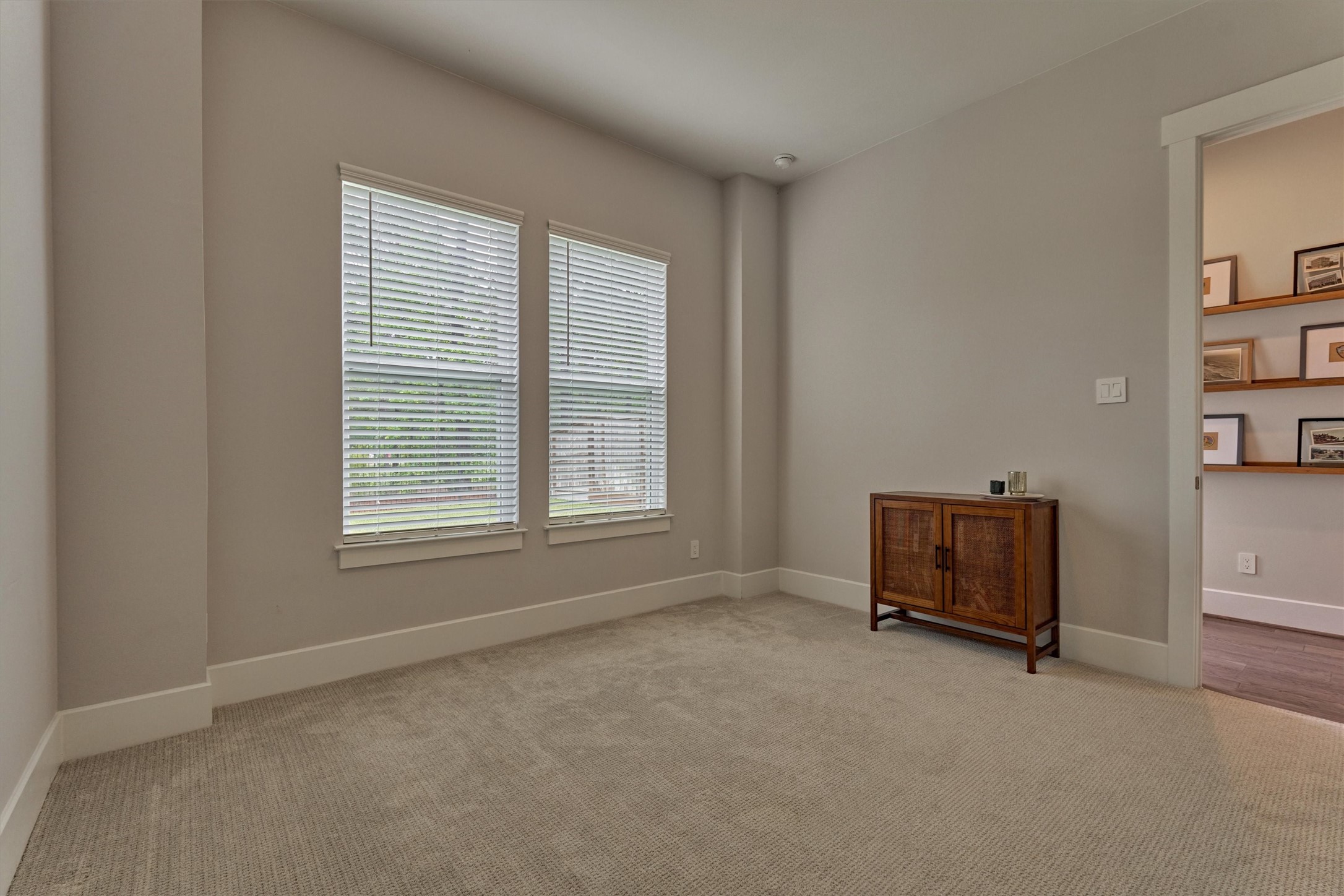 62 Dobbs View Lane Spring, TX 77389 - Photo 31 of 42 an empty room with windows and closet