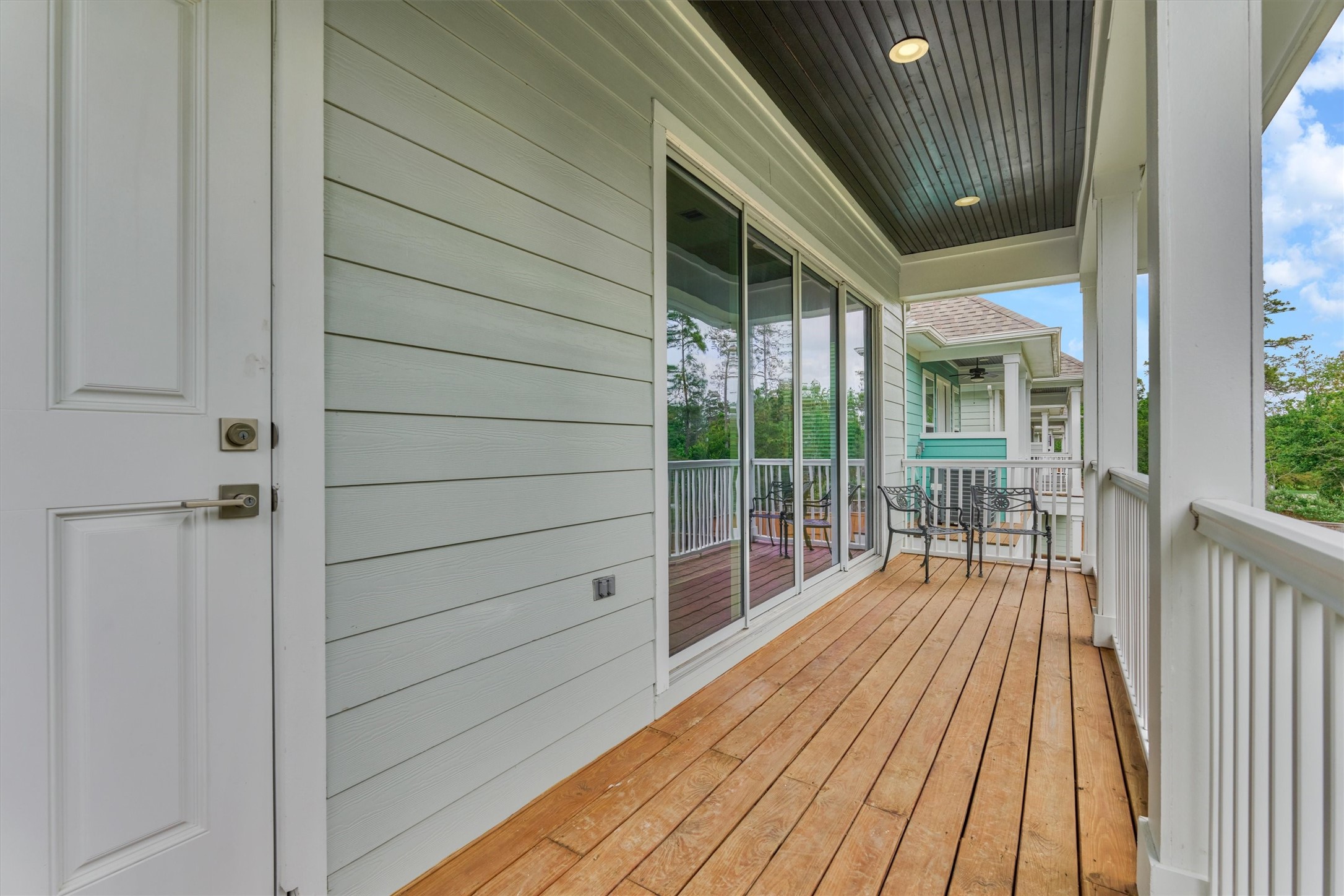 62 Dobbs View Lane Spring, TX 77389 - Photo 34 of 42 a view of balcony with wooden floor