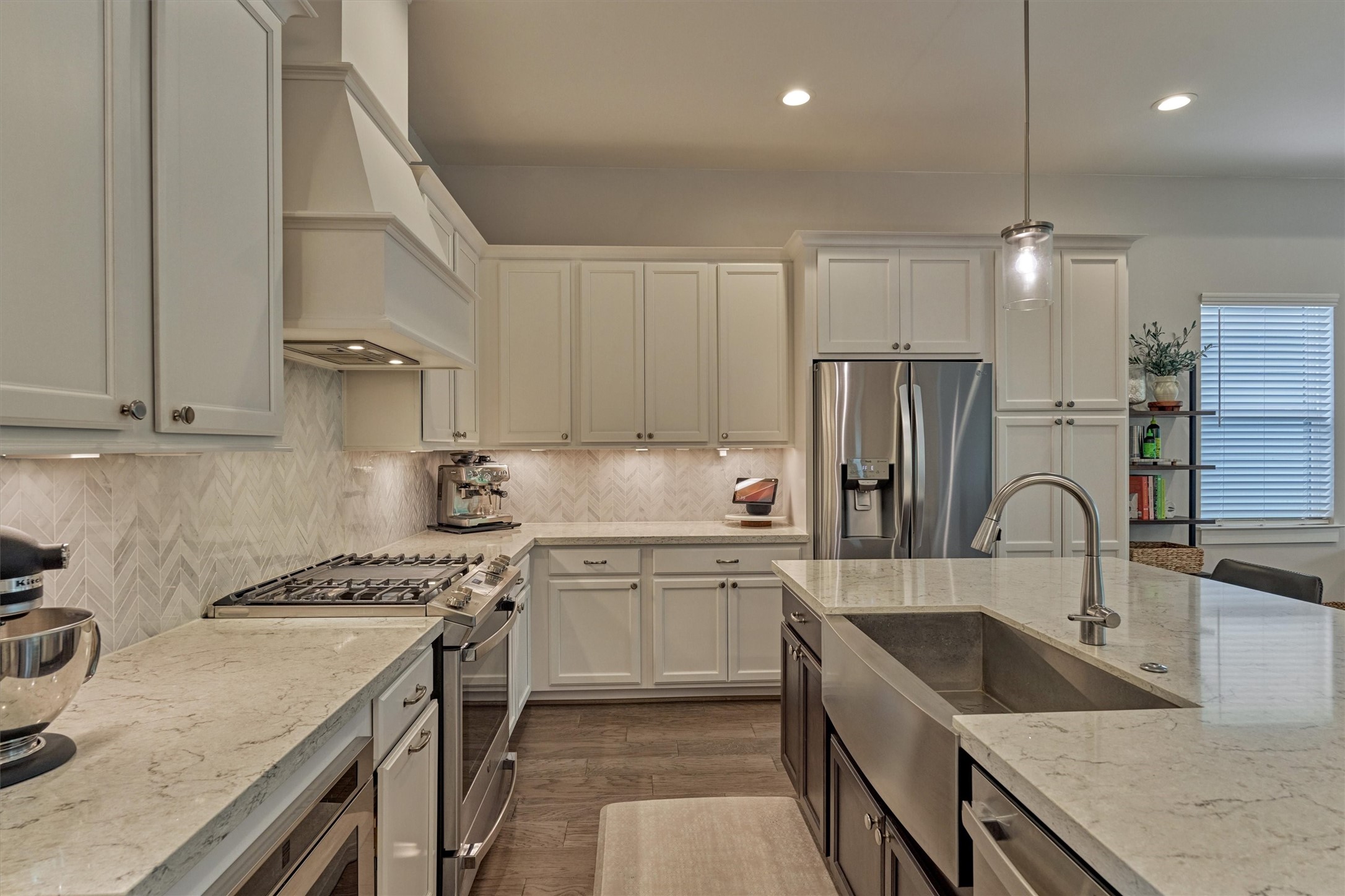 62 Dobbs View Lane Spring, TX 77389 - Photo 10 of 42 a kitchen with stainless steel appliances granite countertop a sink stove and refrigerator