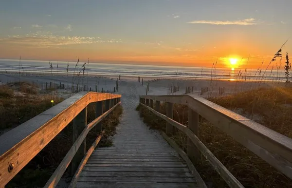 a view of balcony with furniture
