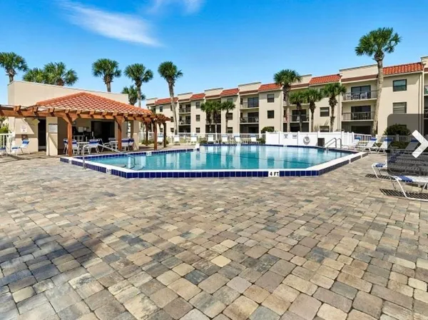 a view of a house with a swimming pool