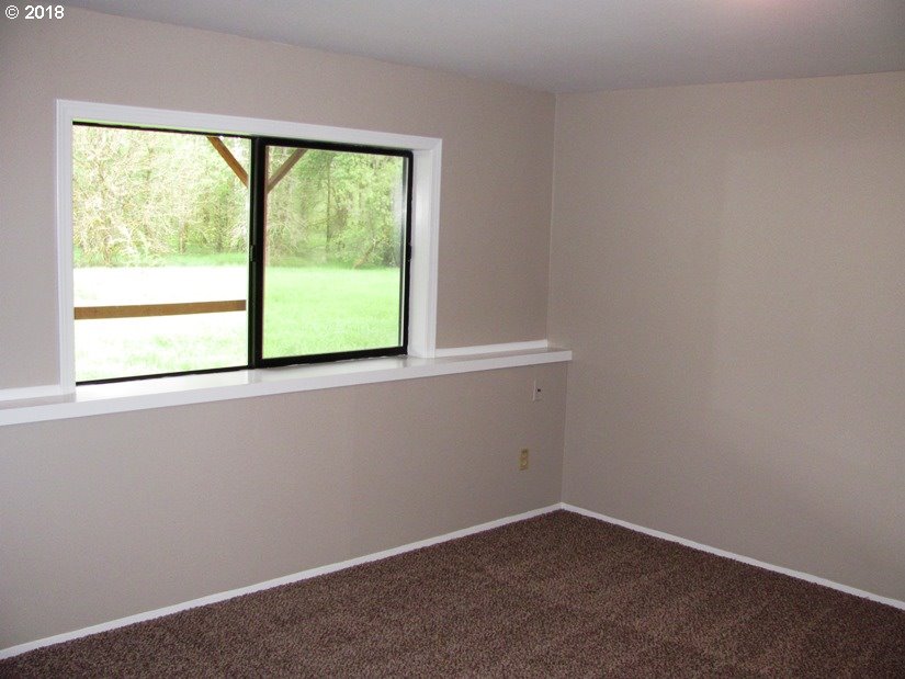 1940 Northeast 3rd Loop Camas, WA 98607 - Photo 16 of 22 an empty room with a window