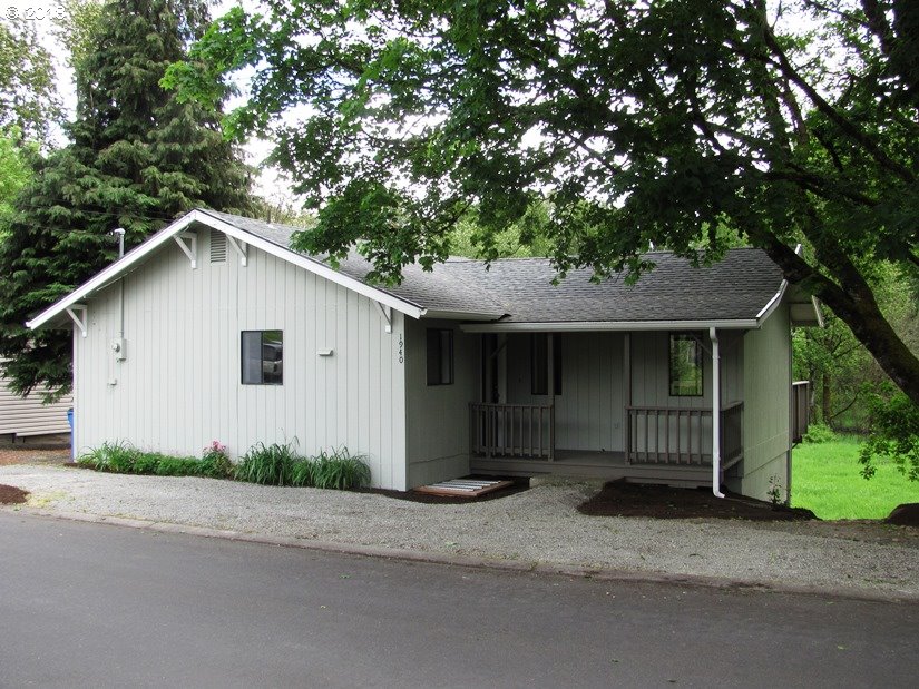 1940 Northeast 3rd Loop Camas, WA 98607 - Photo 2 of 22 a front view of a house with a garage