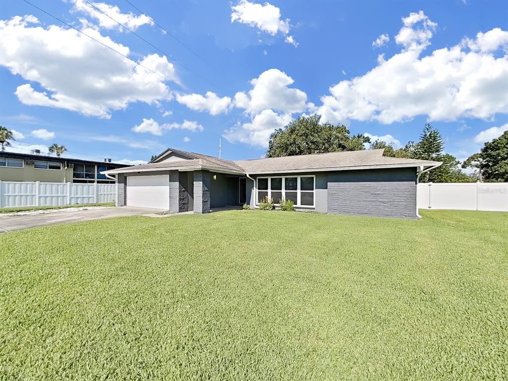 a balcony with table and chairs
