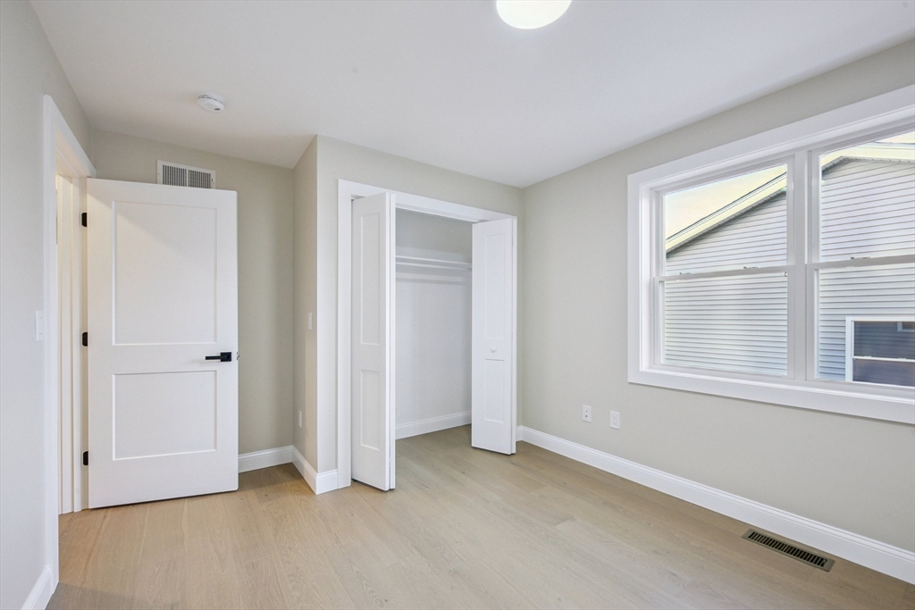 110 Stowe Street, Unit 110 Fall River, MA 02720 - Photo 14 of 21 a view of an empty room with a window