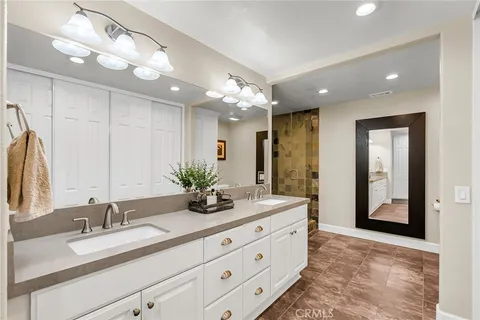 a view of a balcony with wooden floor and plant