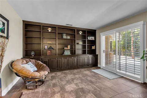 a view of a swimming pool with a garden