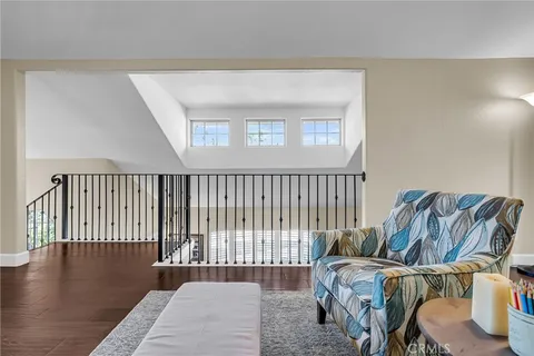 a view of a patio with couches and table and chairs