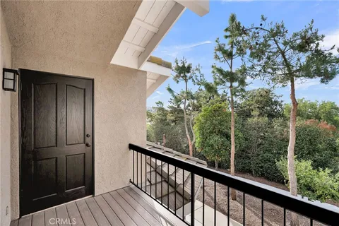 a front view of a house with a garage