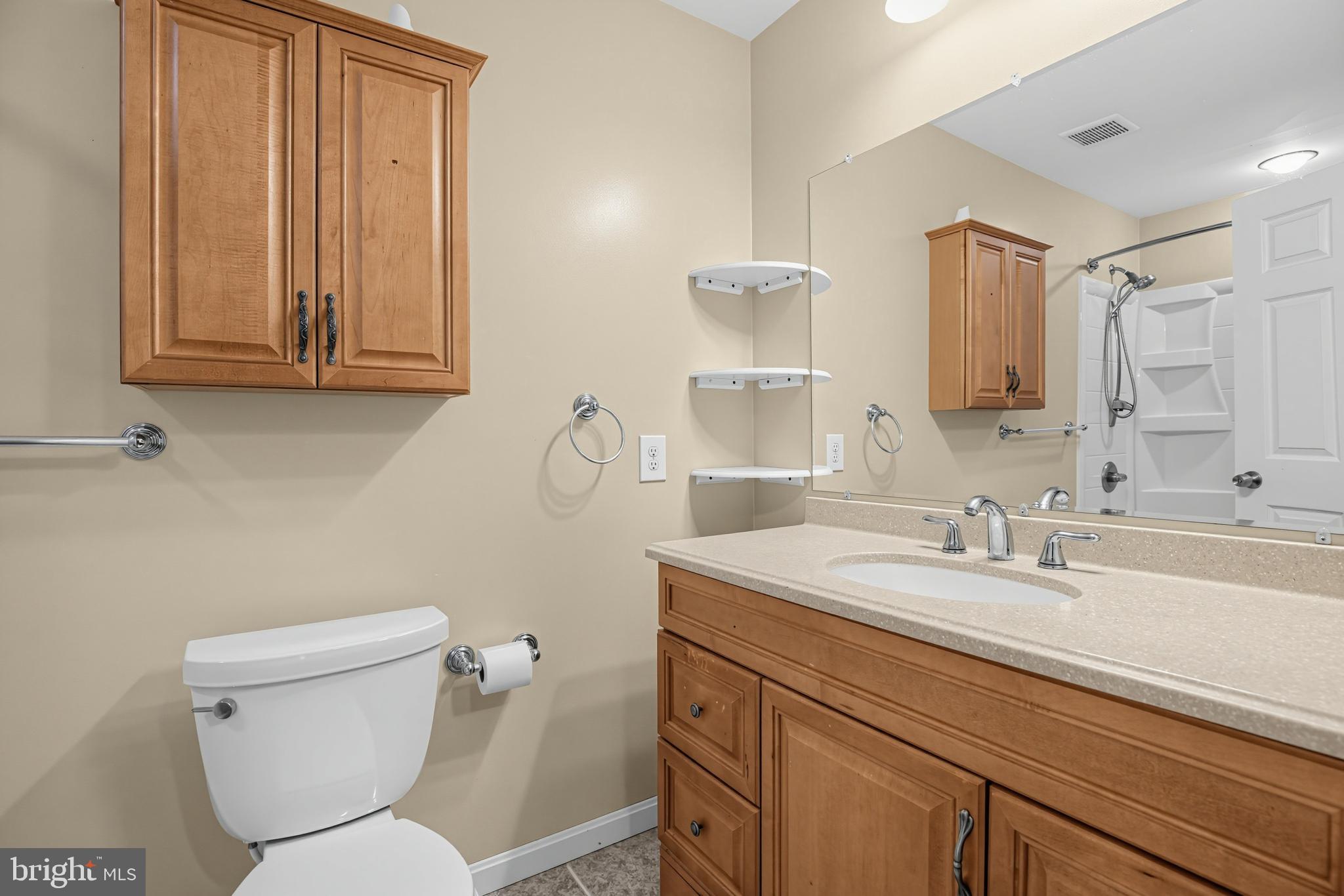 9430 Solomons Island Road North Owings, MD 20736 - Photo 16 of 36 Hallway Bathroom