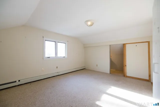 a view of a room with an empty space