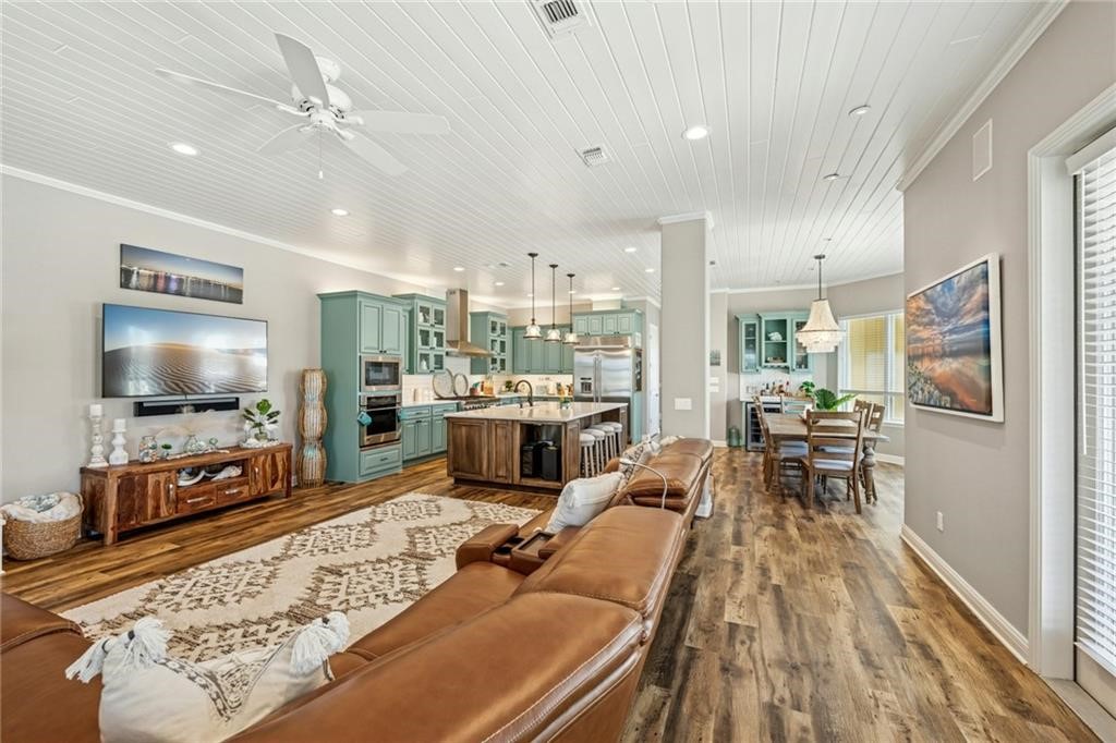 6 Sea Shell Shores Rockport, TX 78382 - Photo 12 of 37 a living room with furniture and a flat screen tv