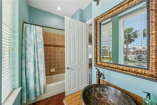 a view of a door and chair in a room