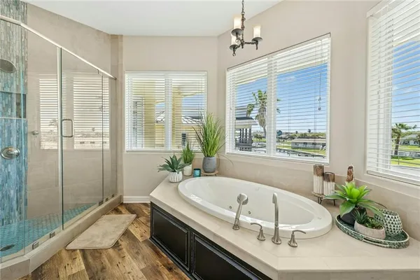 a bath tub sitting in a bathroom next to a tub