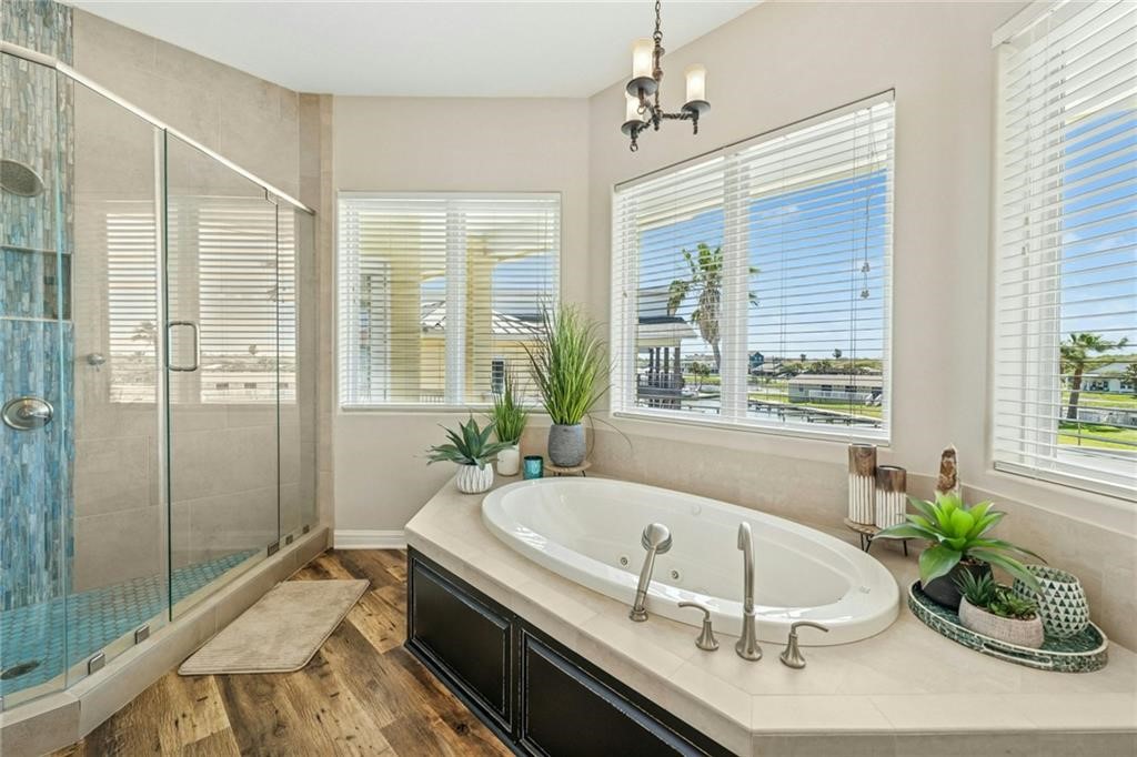 6 Sea Shell Shores Rockport, TX 78382 - Photo 16 of 37 a bath tub sitting in a bathroom next to a tub