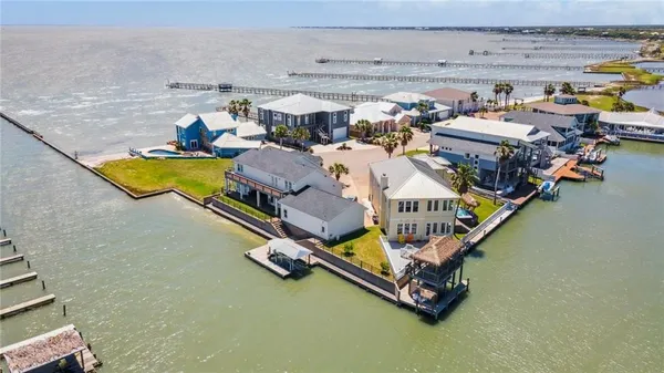 an aerial view of a house with swimming pool
