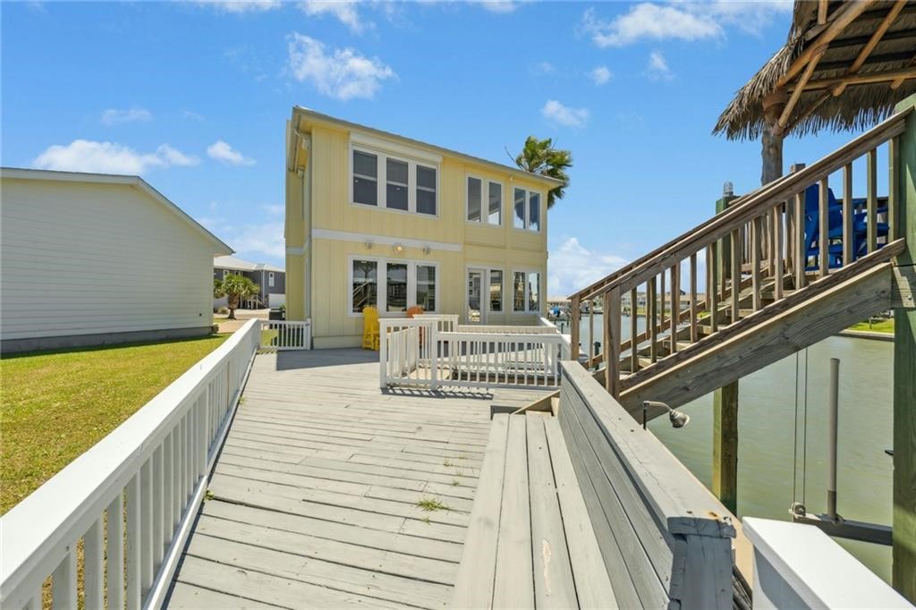 6 Sea Shell Shores Rockport, TX 78382 - Photo 24 of 37 a view of balcony with wooden floor and fence