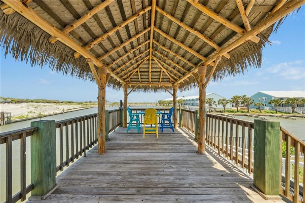 6 Sea Shell Shores Rockport, TX 78382 - Photo 26 of 37 a view of a swimming pool with a patio and a garden