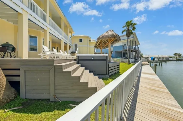 a view of a house with wooden stairs