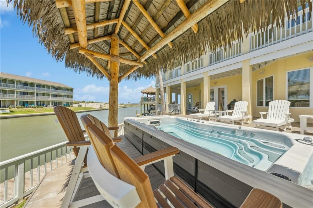 6 Sea Shell Shores Rockport, TX 78382 - Photo 8 of 37 a view of a swimming pool with outdoor seating