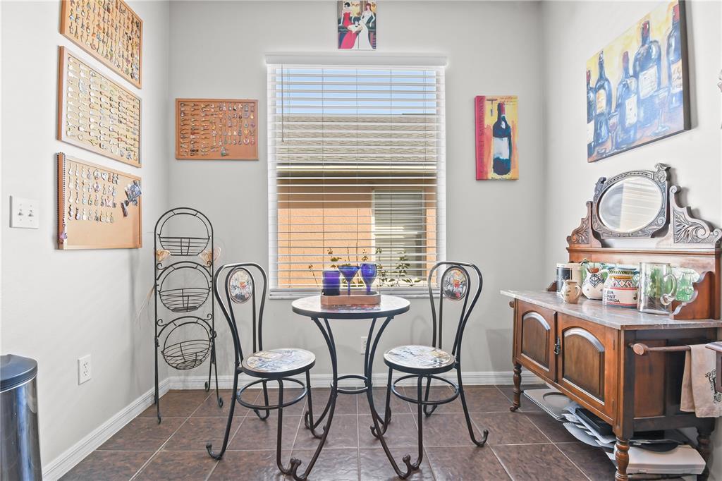 11130 Rodeo Lane Riverview, FL 33579 - Photo 14 of 49 a table and chairs in a room next to a window