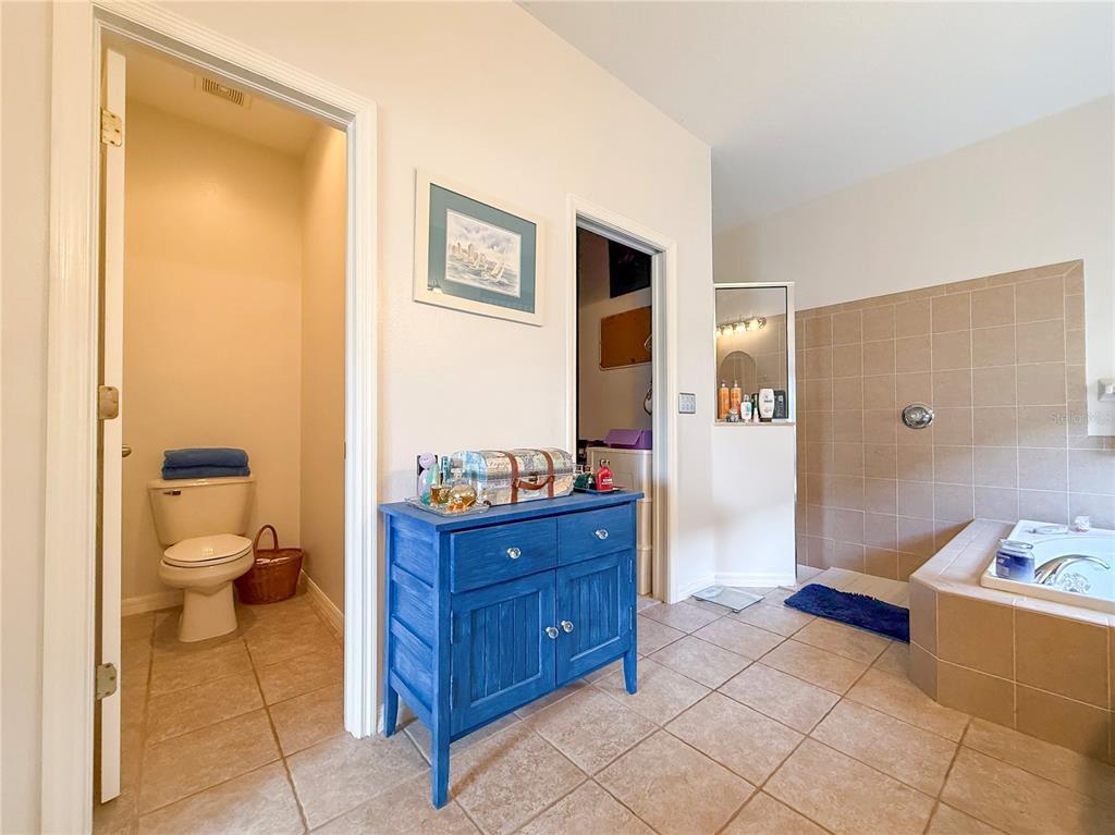 11130 Rodeo Lane Riverview, FL 33579 - Photo 21 of 49 a bathroom with a sink a toilet and shower