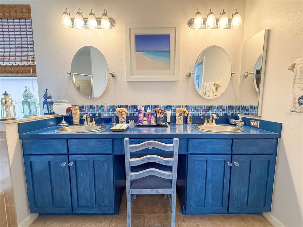 11130 Rodeo Lane Riverview, FL 33579 - Photo 23 of 49 a room with two sink and a mirror