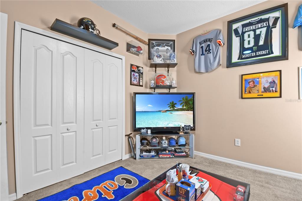 11130 Rodeo Lane Riverview, FL 33579 - Photo 30 of 49 a room with furniture and a gate