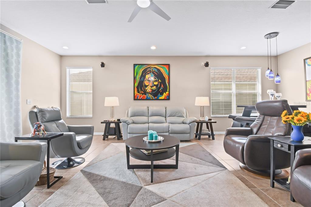 11130 Rodeo Lane Riverview, FL 33579 - Photo 3 of 49 a living room with furniture and a large window