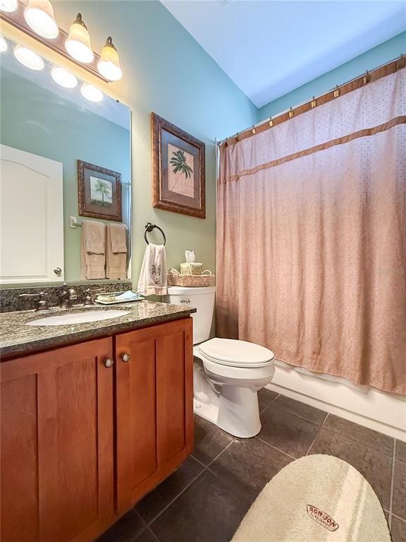 11130 Rodeo Lane Riverview, FL 33579 - Photo 36 of 49 a bathroom with a toilet a sink and a mirror