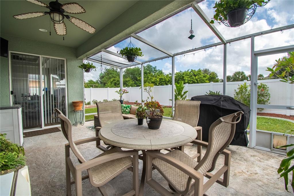 11130 Rodeo Lane Riverview, FL 33579 - Photo 41 of 49 a view of an outdoor dining space with furniture