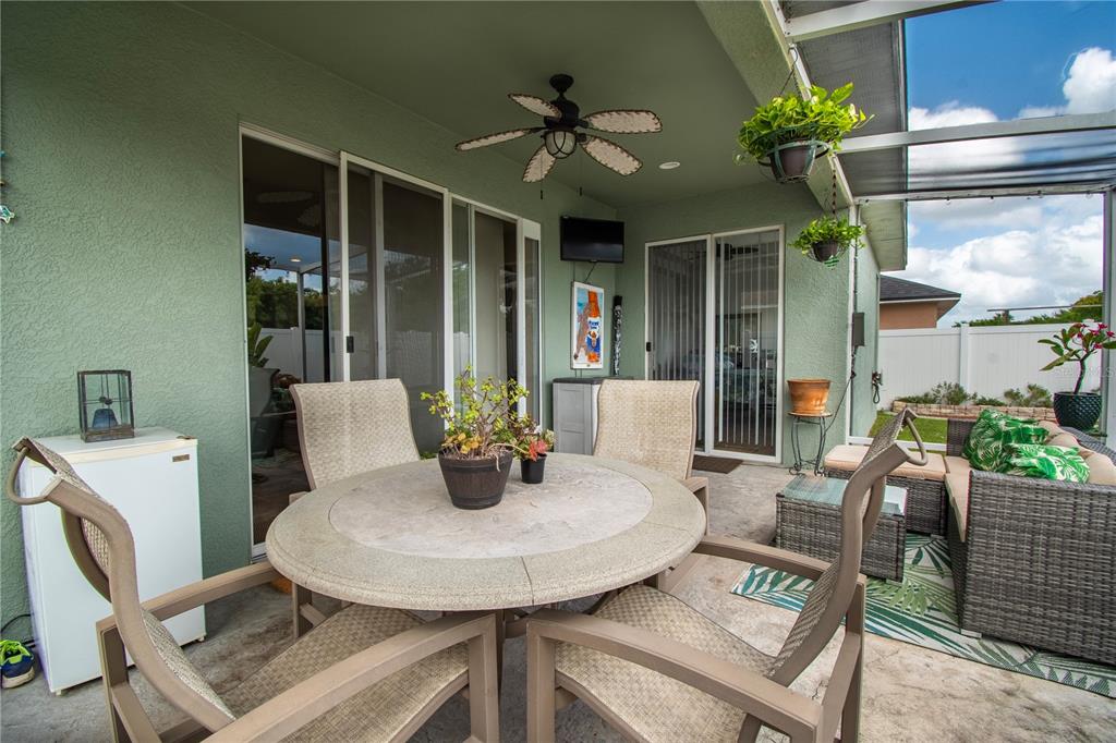 11130 Rodeo Lane Riverview, FL 33579 - Photo 42 of 49 a view of a house with a dining table and chairs