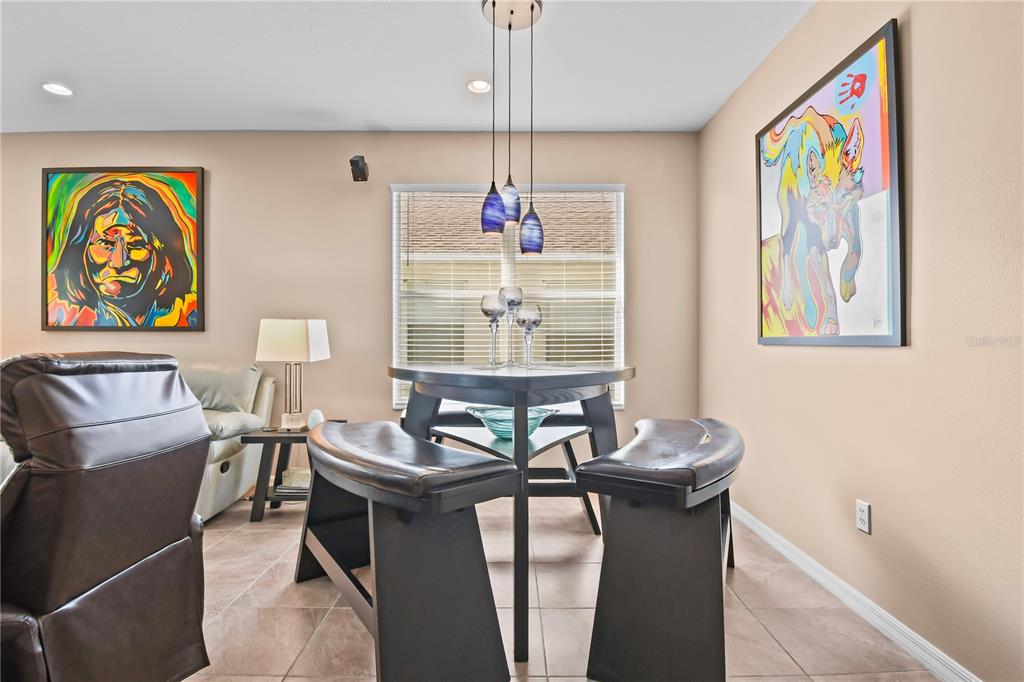 11130 Rodeo Lane Riverview, FL 33579 - Photo 8 of 49 a dining room with furniture and window