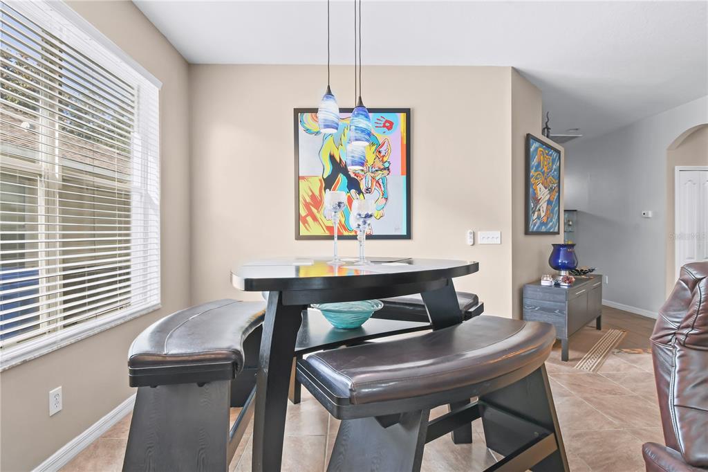 11130 Rodeo Lane Riverview, FL 33579 - Photo 9 of 49 a living room with furniture and a table