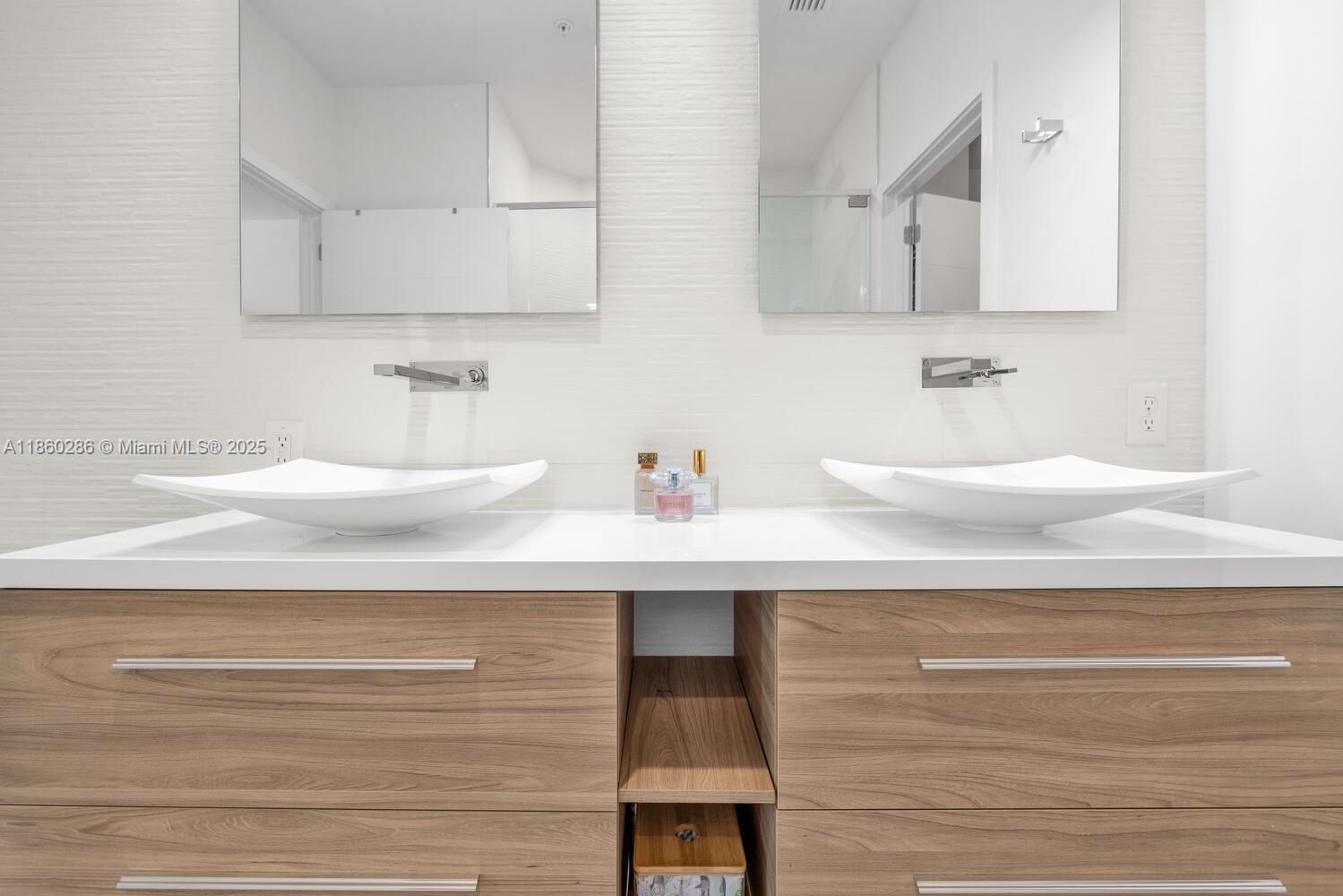 4444 Northwest 8th Court Plantation, FL 33317 - Photo 18 of 40 a bathroom with a sink and a mirror