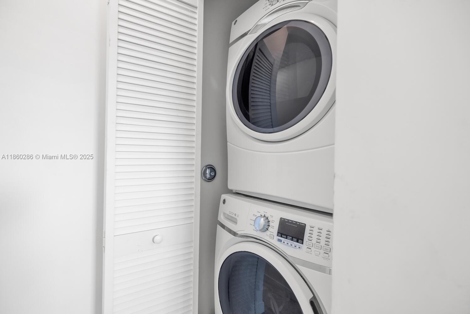 4444 Northwest 8th Court Plantation, FL 33317 - Photo 22 of 40 a utility room with dryer and washer