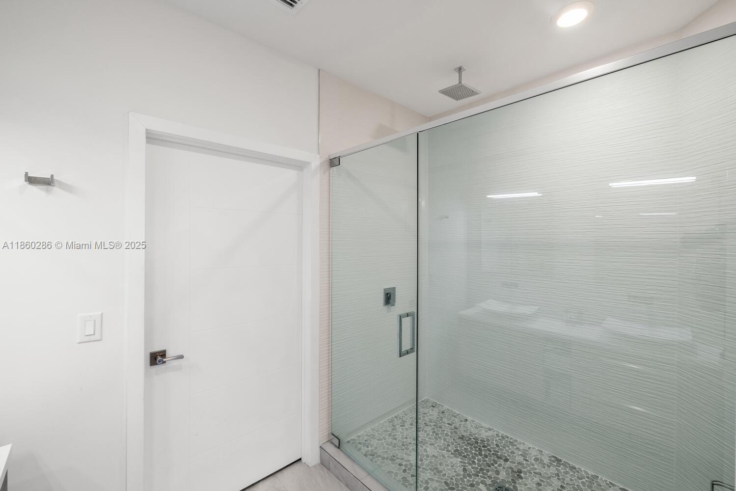 4444 Northwest 8th Court Plantation, FL 33317 - Photo 23 of 40 a bathroom with a shower